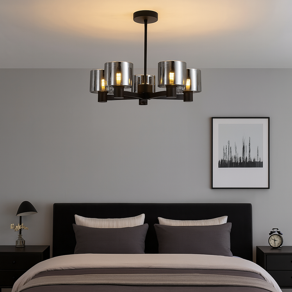 Byron 5 light pendant with smoky glass shades styled in a modern bedroom with black accents.
